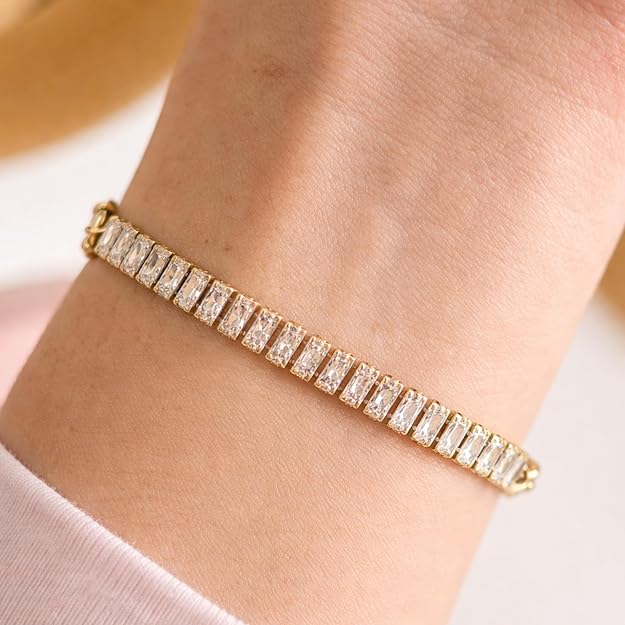 Salve Baguette Stone Tennis Bracelet featuring sparkling baguette-cut stones on a silver-tone bracelet design.
