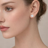 Round cut stainless steel stud earrings by SALVE featuring sleek, polished silver-tone earrings with a minimalist design.