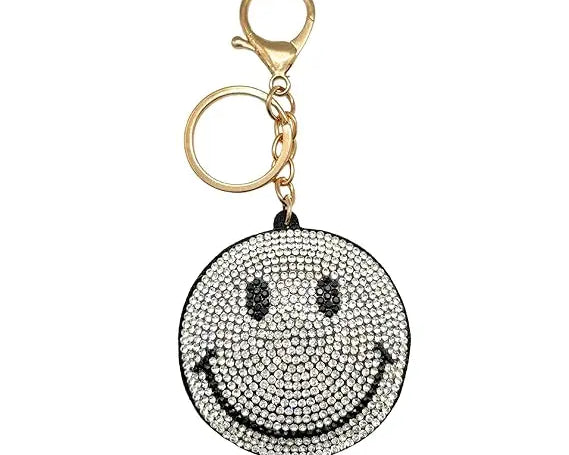 Bright yellow Puffy Smiley Face Keychain by SALVE with a cheerful, plush design and metal keyring attachment.