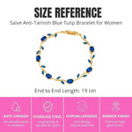 Blue Tulip Bracelet by SALVE featuring intricate tulip-shaped charms and delicate silver chain design.