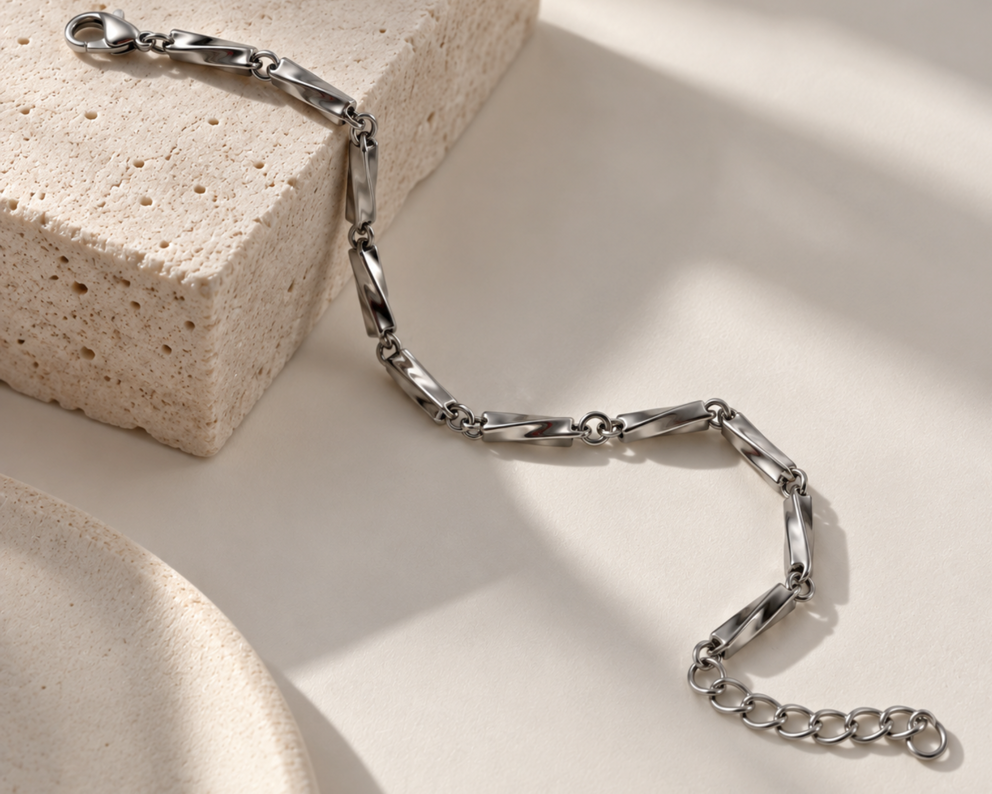Silver-toned minimal bracelet for men by SALVE, featuring sleek, simple design with smooth metal finish.