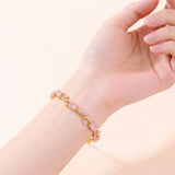 Salve Baby Pink Tulip bracelet for women featuring delicate pink tulip charm on a silver-toned bracelet.