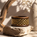 Salve chunky wooden bangle bracelet stack featuring multiple natural wood bangles with smooth finishes, stylish and versatile jewelry.