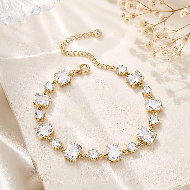 SALVE emerald cut and round stone bracelet with elegant design, featuring sparkling stones on a delicate metal band.