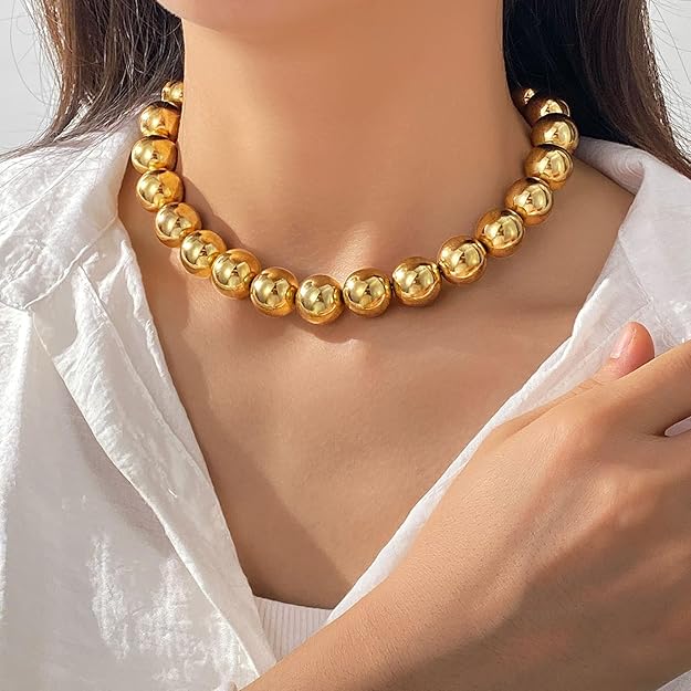 Salve chunky gold beaded aesthetic necklace featuring large gold beads on a stylish chain for a trendy jewelry look