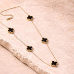 Salve Black Clover gold chain necklace with thick links, stylish jewelry accessory on a plain background.