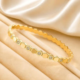 Salve CZ honeycomb hexagonal openable bracelet with gold-tone links and adjustable clasp, stylish jewelry accessory.