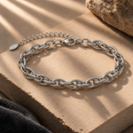 Silver Cross Link Bracelet for Men by Salve, featuring sleek metallic links and a modern design, displayed on a neutral background.