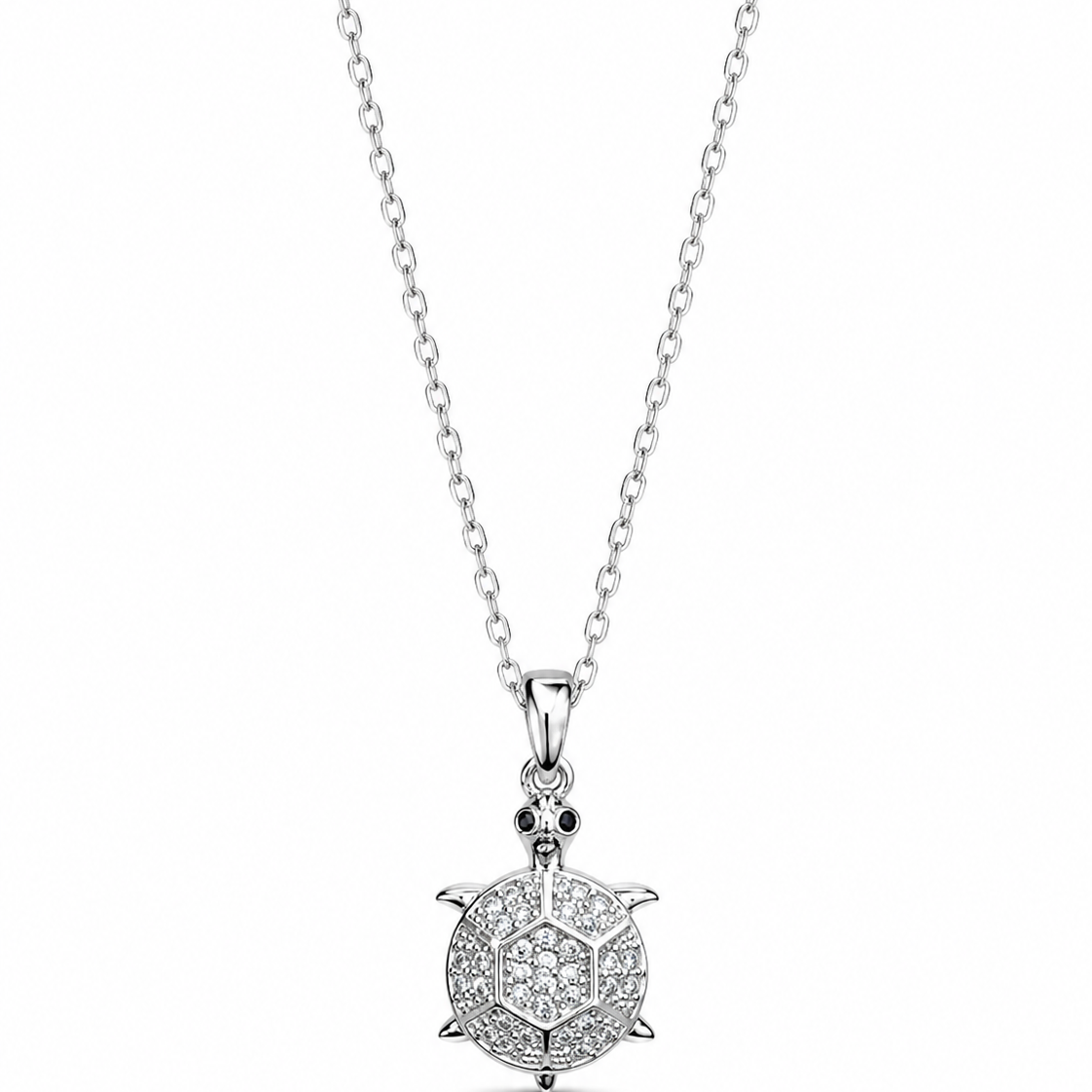 Stainless steel CZ turtle pendant necklace with detailed turtle design, crafted by SALVE, on a sleek chain.