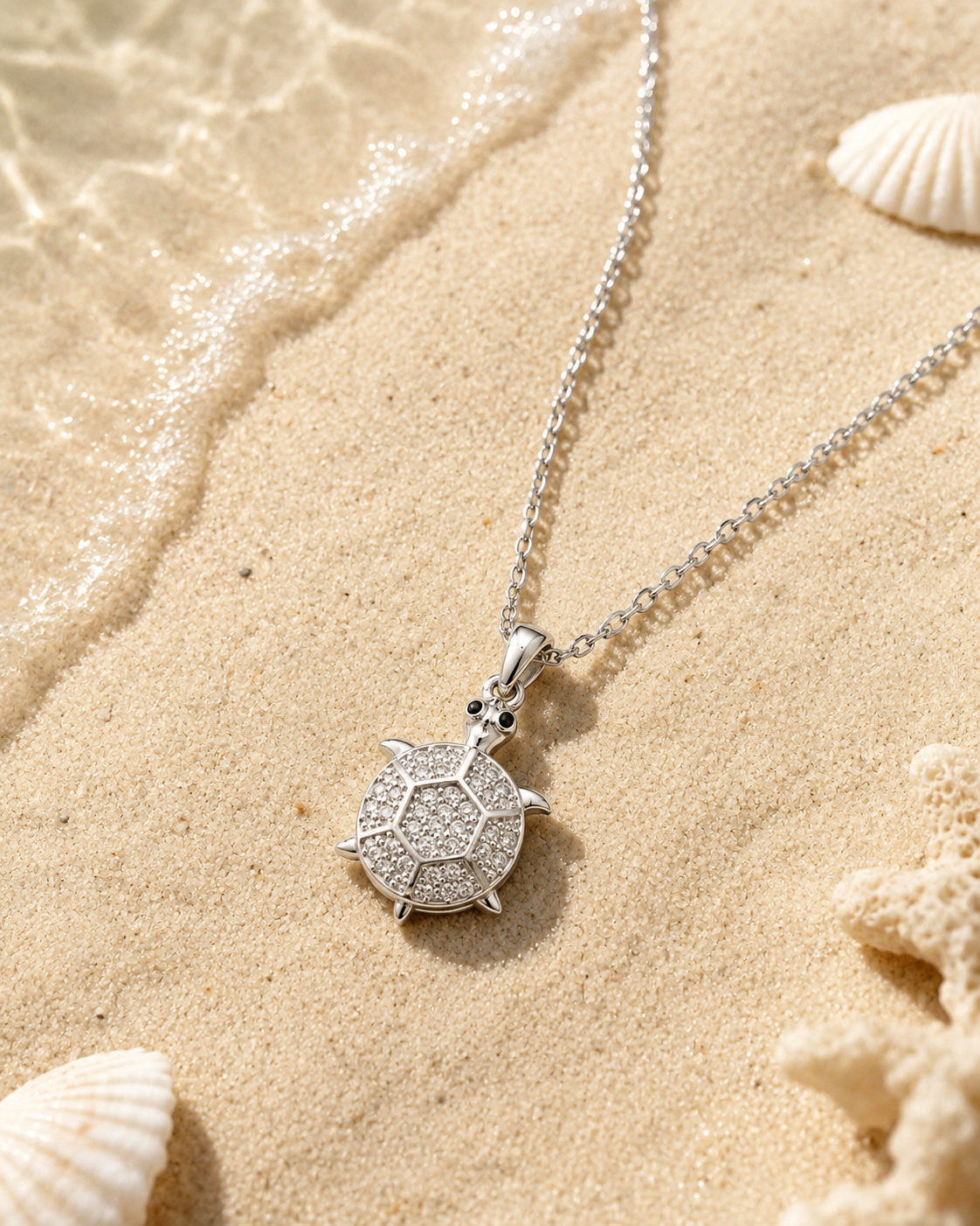 Stainless steel CZ turtle pendant necklace by SALVE featuring a detailed turtle charm with sparkling cubic zirconia accents.