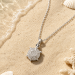 Stainless steel CZ turtle pendant necklace by SALVE featuring a detailed turtle charm with sparkling cubic zirconia accents.