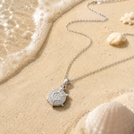 Salve stainless steel turtle pendant necklace with cubic zirconia accents, showcasing a detailed turtle design and polished finish.