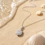 Salve stainless steel turtle pendant necklace with cubic zirconia accents, showcasing a detailed turtle design and polished finish.