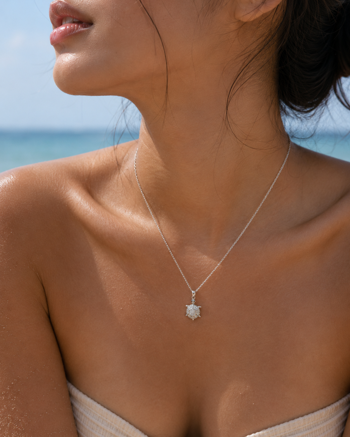 Salve stainless steel turtle pendant necklace with cubic zirconia details, featuring a detailed turtle design on a sleek chain.