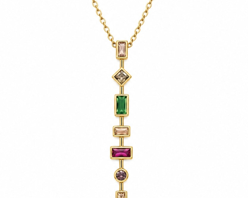 Colorful 7-stone pendant necklace by SALVE featuring multi-color stones on a delicate chain.