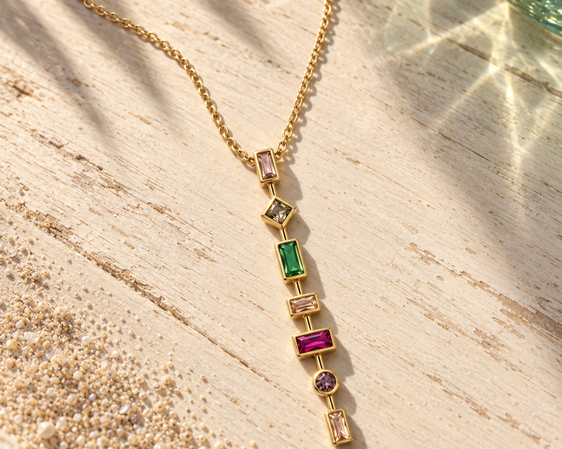 Multi-color 7-stone pendant necklace by SALVE featuring a vibrant, round gemstone design on a delicate chain.